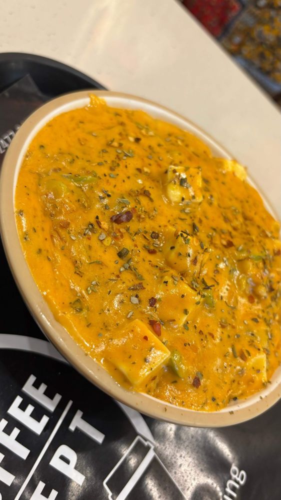 Paneer in rich gravy on a TCC tray