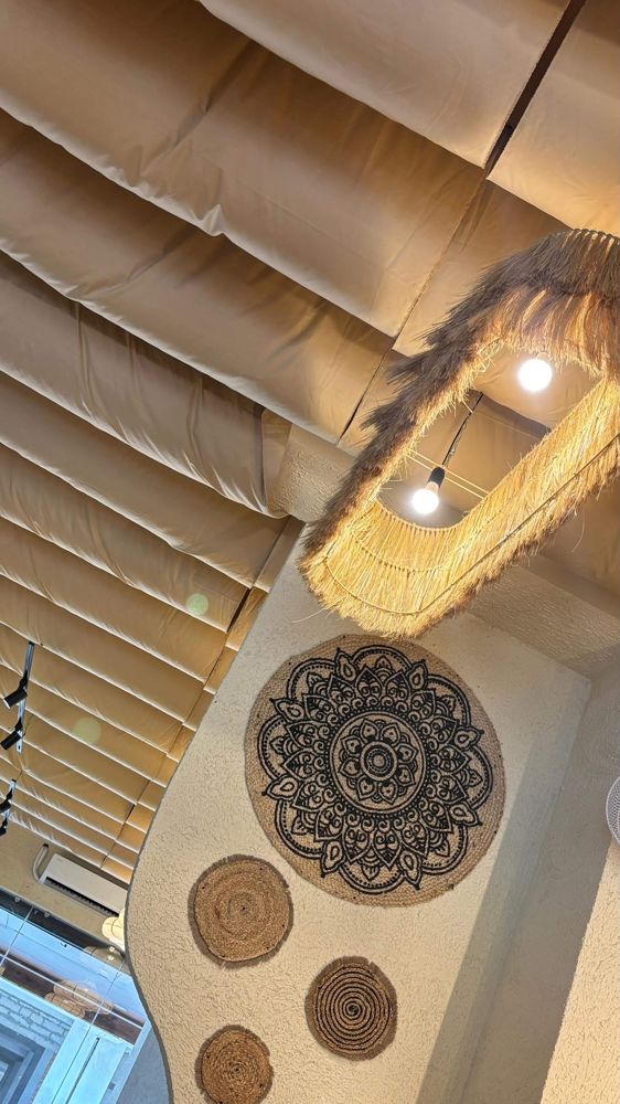 Raffia pendant lamp and woven wall plates